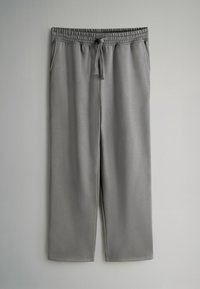 Grau Sweatpants aus weichem Stoff, mit einem elastischen Bund inklusive Kordelzug, seitlichen Taschen und einer lässigen Passform.