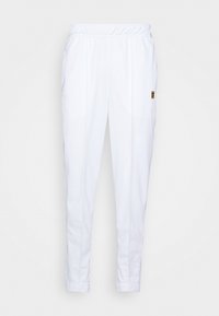 Witte, lichte sportbroeken met een elastische tailleband, zijzakken en slim fit. Kenmerkt subtiele stiksels en een klein logo accent.