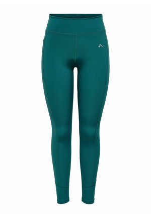 Leggings de sport taille haute couleur sarcelle avec un petit logo réfléchissant sur la partie supérieure de la cuisse gauche, conçus pour un ajustement près du corps.