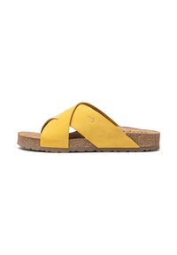 Sandalia deslizable de ante amarillo con diseño de tiras cruzadas, suela de corcho y suela texturizada marrón. Presenta bordes redondeados y sin herrajes visibles.