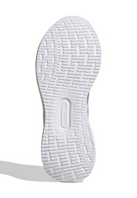 Hvid sneaker sål med struktureret greb, der har et mønstret dækdesign. Inkluderer et centralt oval udskæringer og let krumning ved kanterne.