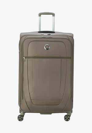 Brown fabric suitcase with a textured surface, two zippered compartments, a silver circular logo, and a retractable handle on top.