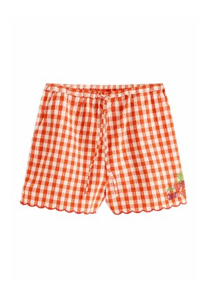 Punase ja valge ruudulise mustriga lühikesed püksid elastse vöökoha, paelaga, lainelise äärega ja tikitud maasikaaktsentidega.