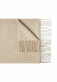 Lys beige cashmere tæppe med en blød tekstur, der viser et foldet hjørne og frynsedetaljer langs en kant.