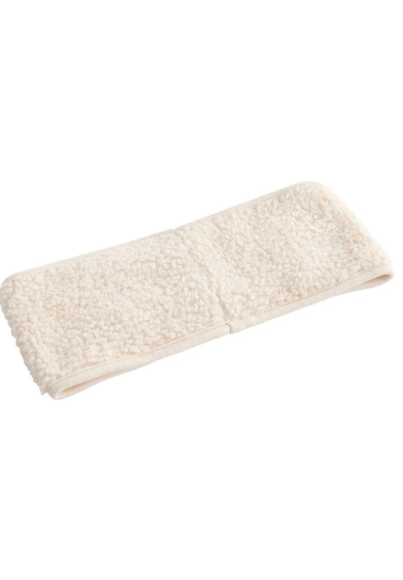 Cappello elastico di colore crema morbido con una consistenza soffice, caratterizzato da una fascia larga e bordi cuciti. Il design privilegia comfort e calore.