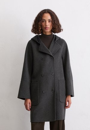 Donkergrijze wollen jas met een capuchon, dubbelzijdig ontwerp, twee voorzakken en oversized mouwen voor een ontspannen pasvorm.