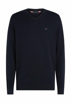 Marineblauer Langarm-Pullover mit V-Ausschnitt, gerippten Bündchen und Saum, mit einem kleinen rechteckigen rot-weiß-blauen Logo auf der linken Brust.