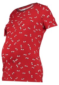 Röd graviditetst-shirt i mjukt bomull med kort ärm, rund hals och ett blommönster med vita och svarta blommor.