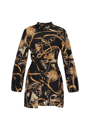 Jurk met lange mouwen van zwarte stof met een gouden bloemen- en kettingprint. Heeft een hoge halslijn en geplooide details bij de taille.