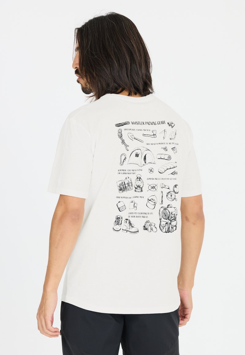 Valkoinen puuvillainen T-paita, jossa on rento leikkaus, takaosassa musta kuvittelu "Whistler Packing Guide" eri vaellustarvikkeista.