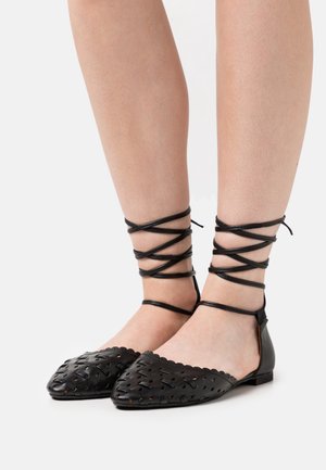 Lazamani Babies - black