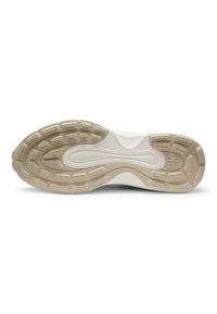 Shoe sole with a patterned rubber design, featuring a beige color with textured accents and a logo on the side.