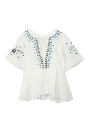 Hvid kortærmet bluse med blå og sort blomsterbroderi, bindebånd ved halsudskæringen og peplumkant.