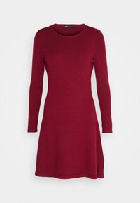 Pitkähihainen, pyöreäkauluksinen tummanpunainen mekko, jossa on istuva vartalo ja levenevä hame. Pehmeä kangas, jossa on sileä pinta ja siisti helma.