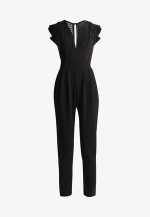 Black jumpsuit with a plunging neckline, cap sleeves, and lace back detail. Features a fitted waist and tapered legs. Smooth fabric texture.
