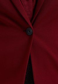 WE Fashion CURVE - Blejzr - red