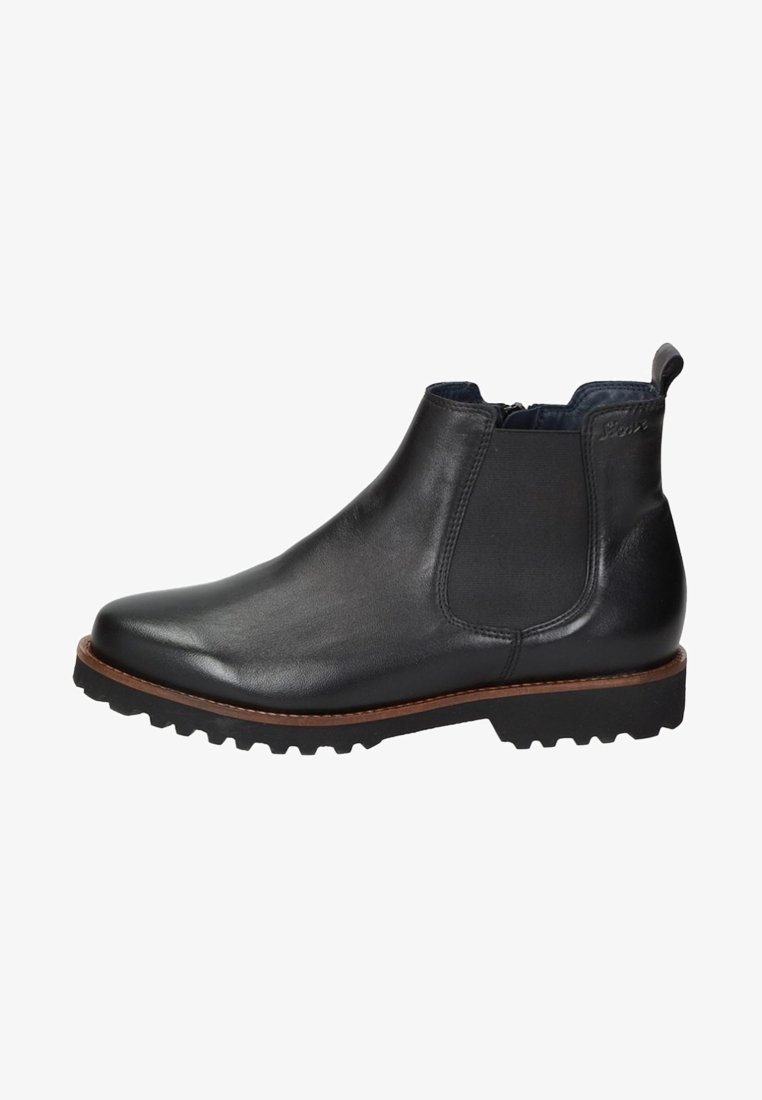 Bottine Chelsea en cuir noir avec panneau latéral élastique, bordure marron, semelle noire crantée et languette arrière.