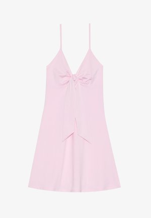 Pink sleeveless dress featuring a front knot detail and flared skirt. Made of soft fabric with a smooth texture. Adjusted thin straps.