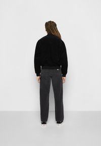 Carhartt WIP LETTERMAN JACKET - Bombertakki - black/wax