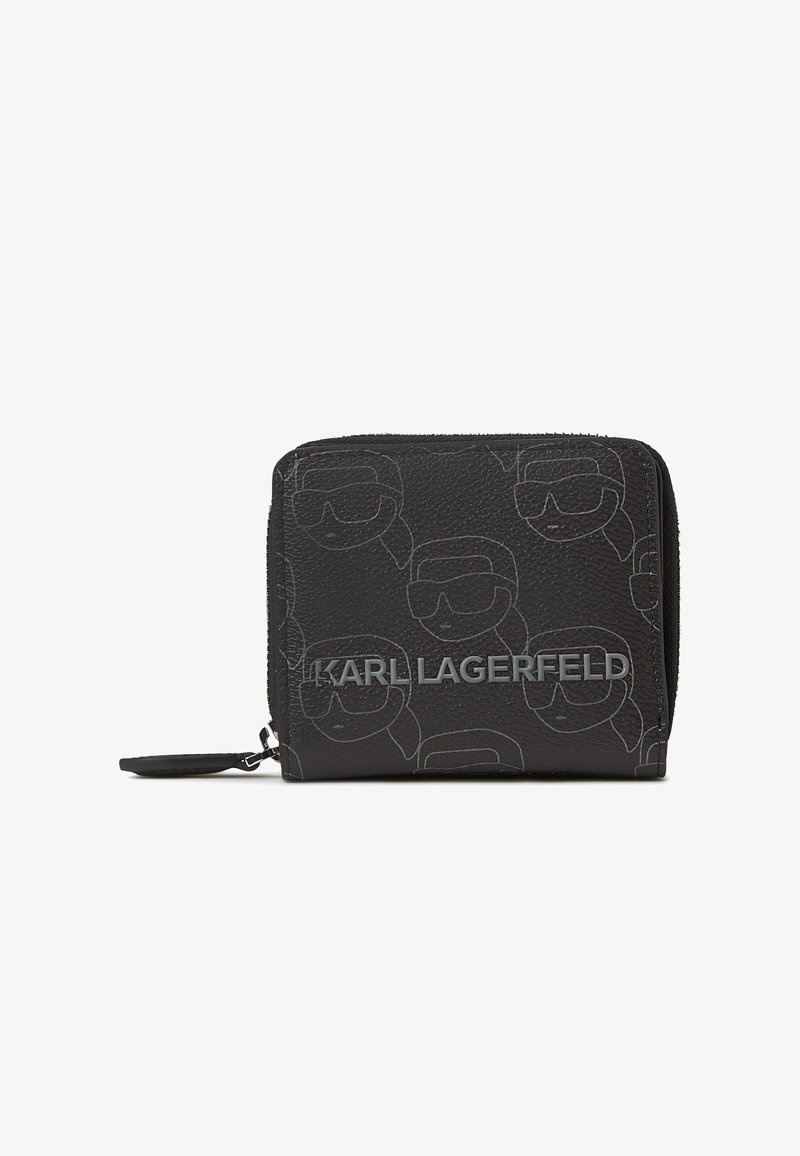 Must mustra nahkrahakott, millel on reljeefne nägude muster, hõbedane "KARL LAGERFELD" logo, tõmbluku sulgemine ja külgklambri aas. Kompaktne ristkülikukujuline kuju.