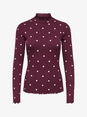 Bordeauxrød langærmet ribbet top med hvide prikker, med høj rynket hals og bølget kant. Glat tekstur over det hele.