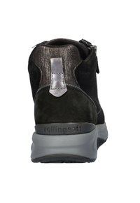 Black suede ankle boot with a metallic woven back, zip closure, and rubber sole featuring the "rollingsoft" branding.