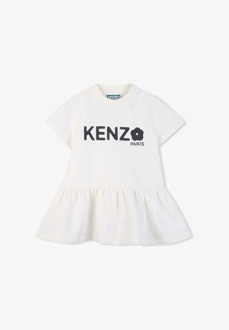 Witte katoenen jurk met korte mouwen, uitlopende zoom en zwarte "KENZO PARIS" tekstprint met bloemaccent. Drukknoopsluiting aan de schouder.