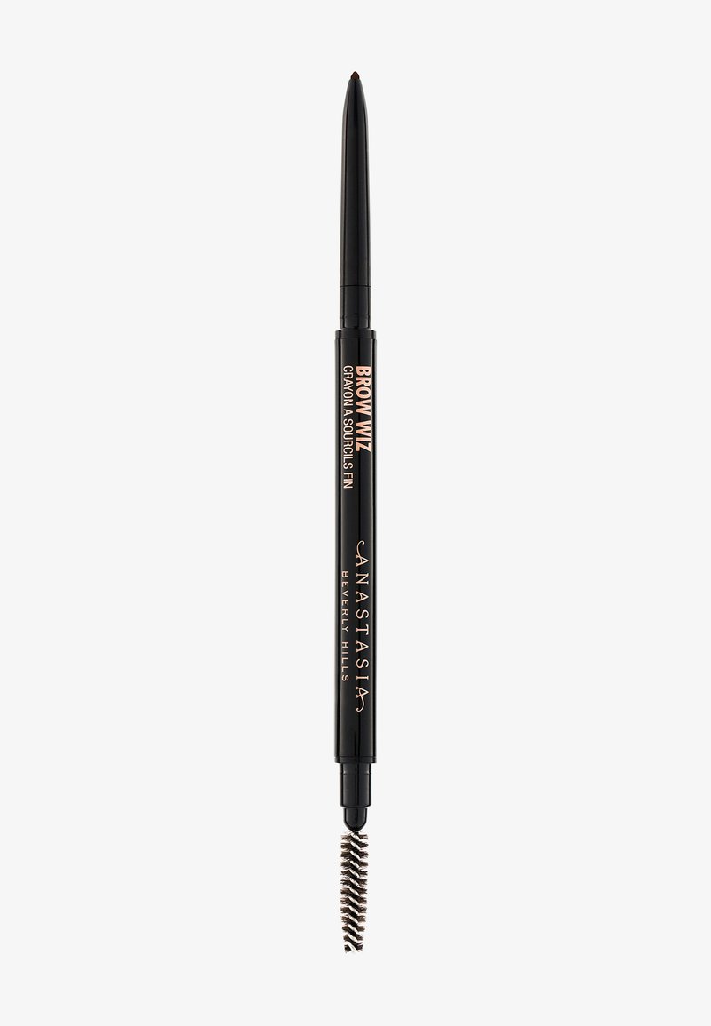 Brow Wiz eyebrow pencil in black with a fine tip and retractable design. Includes a spiral brush at the end for blending.