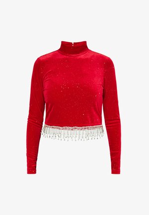 Punane sametist lühike topp pikkade varrukatega, kõrge kaelusega, hõbedaste helmed äärtes ja kangale puistatud sädelused.