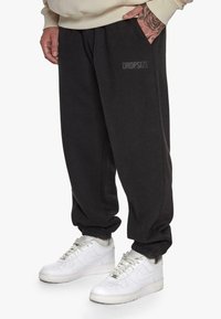 Dropsize LOOSE FIT  - Træningsbukser - black