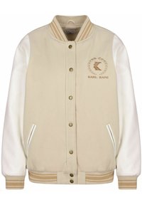 Beige varsity-jakke med hvite faux lærermansjetter, stripete ribbede mansjetter og hem, brodert logo på venstre bryst, og trykknapp-lukking.