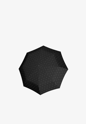 Black umbrella with small white polka dots, viewed from above, fully open against a white background.