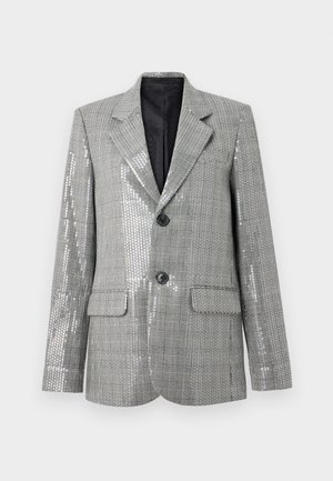 Grey checkered blazer with black buttons and subtle silver sequin accents on front and sleeves, featuring lined interior and front flap pockets.