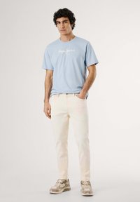 Pepe Jeans Traperice suženog kroja - ivory white