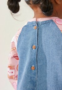 Next Farkkumekko - pink