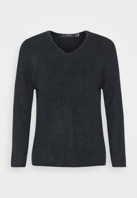 Dark gray knit sweater featuring a v-neck and long sleeves. The texture is soft, with a subtly ribbed pattern and raw-edge detailing.