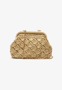Woven straw handbag in light beige with a textured floral pattern, featuring a gold chain strap and a rounded metal clasp closure.