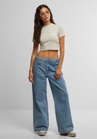 DEF TRIP BAGGYS - Relaxed fit jeans - light blue