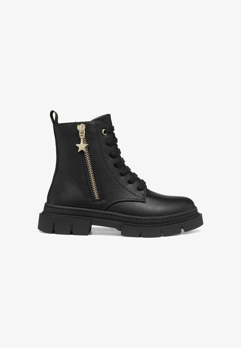 Bottine noire en cuir à lacets avec semelle épaisse, fermeture éclair latérale dorée et tirette en forme d'étoile.