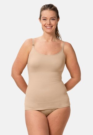 Top in beige con spalline sottili regolabili, design aderente, texture liscia e una cucitura sottile in vita. Abbinato a un paio di slip coordinati.