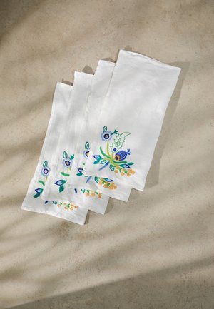 Set of three white linen napkins featuring colorful floral embroidery in blue, green, and yellow. Textured fabric with a soft finish.
