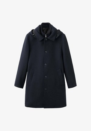 Marineblå uldblanding frakke med hætte, som har knaplukning, to sidelommer og et lige snit. Glat tekstur og minimalistisk design.