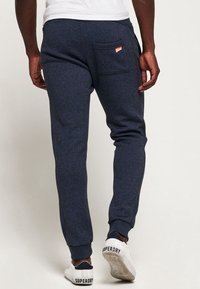 Superdry & Co Spodnie treningowe