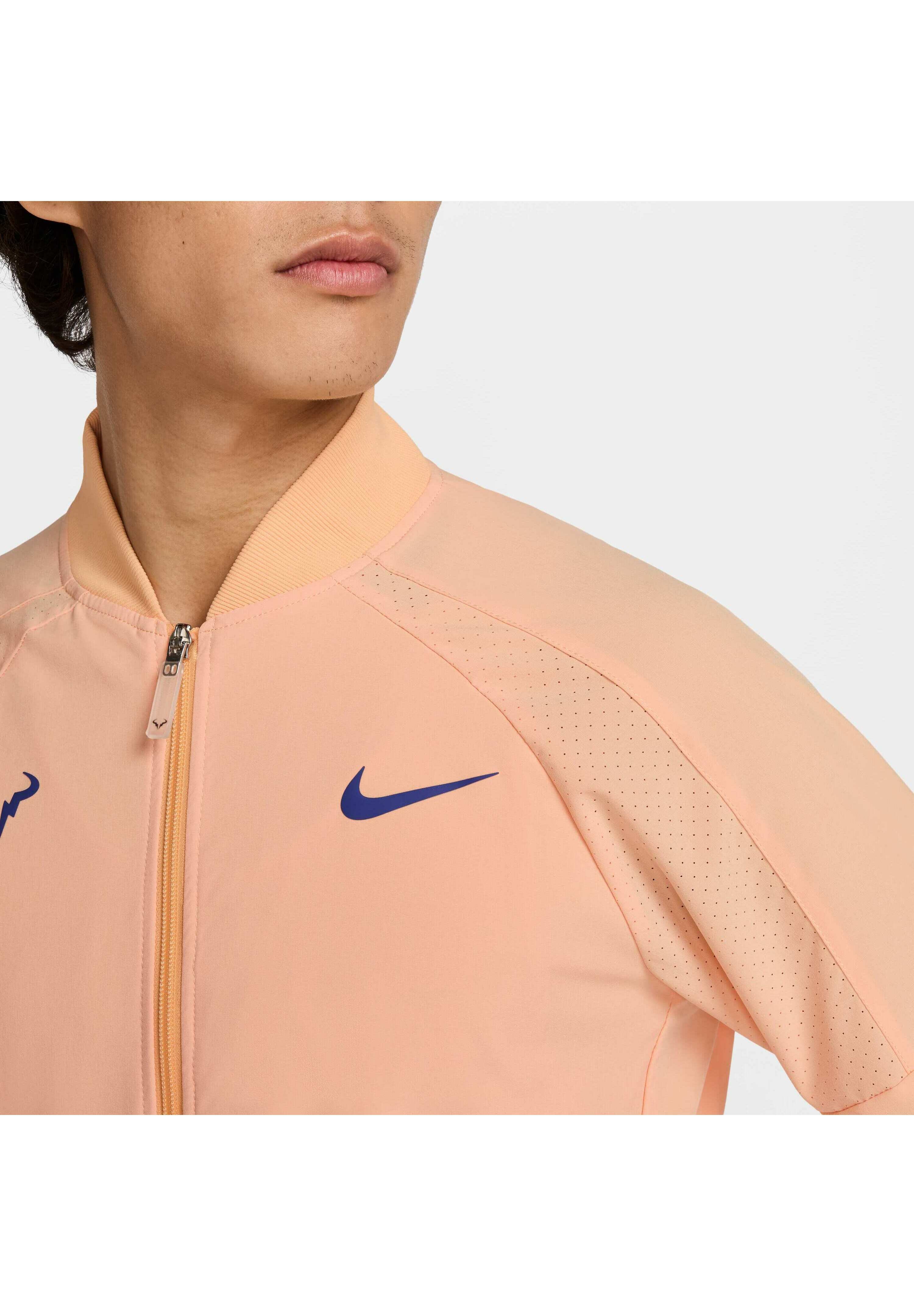 Nike Performance DRI-FIT RAFA - Training jacket - orange chalk