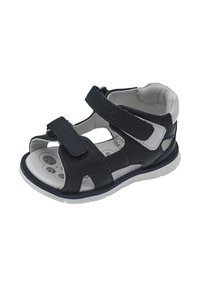 Sandale en cuir bleu marine avec deux sangles ajustables en Velcro, design à bout ouvert, semelle blanche et semelle perforée pour la ventilation.