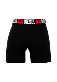 Czarne bokserki z szerokim elastycznym paskiem w logo "DIESEL" w kolorze czerwonym i białym. Gładka faktura, klasyczny krój.