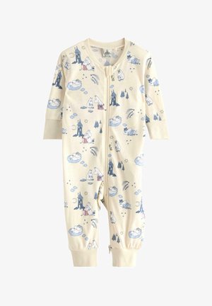 Flødefarvet heldragt med blå illustrationer af fantasifulde figurer, skyer og træer. Den har lange ærmer og lynlås.