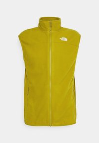 Fleece-Weste in leuchtendem Gelb mit hohem Kragen, durchgehendem Reißverschluss und zwei seitlichen Taschen. Mit weißem Logo auf der oberen linken Seite.