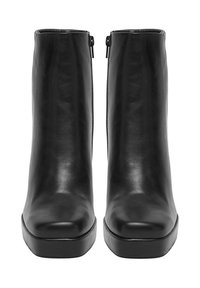 Czarne skórzane botki za kostkę o eleganckim, gładkim wykończeniu. Kwadratowy nos i zamek błyskawiczny z boku do zapinania. Masywna podeszwa na platformie dla dodatkowej wysokości.