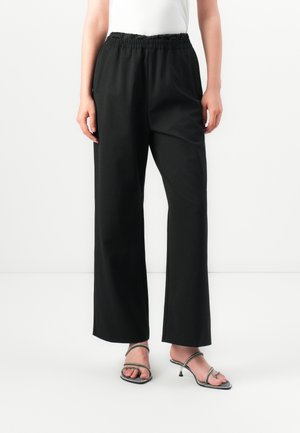 YRITE - Pantaloni - black